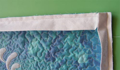 Machine stitched binding