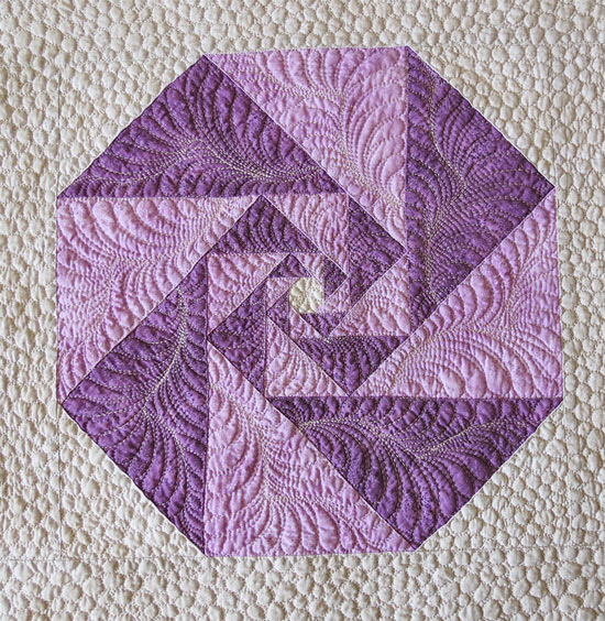 Free Motion Quilting Feathers on triangles