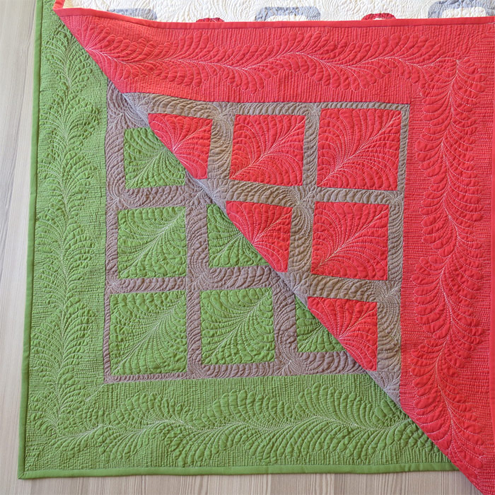 Modern geometric three color quilt pattern- an easy to sew patchwork quilt using simple blocks.