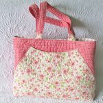 A large quilted tote bag