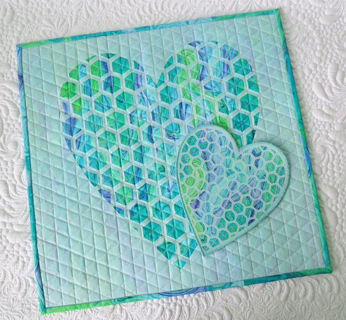 Heart quilt- reverse applique