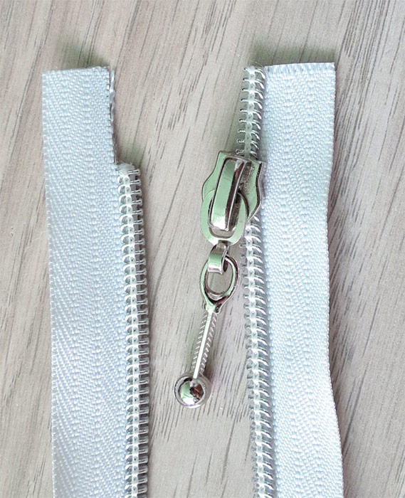 How to add slider to zipper tape