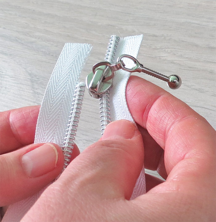 How to add slider to zipper tape