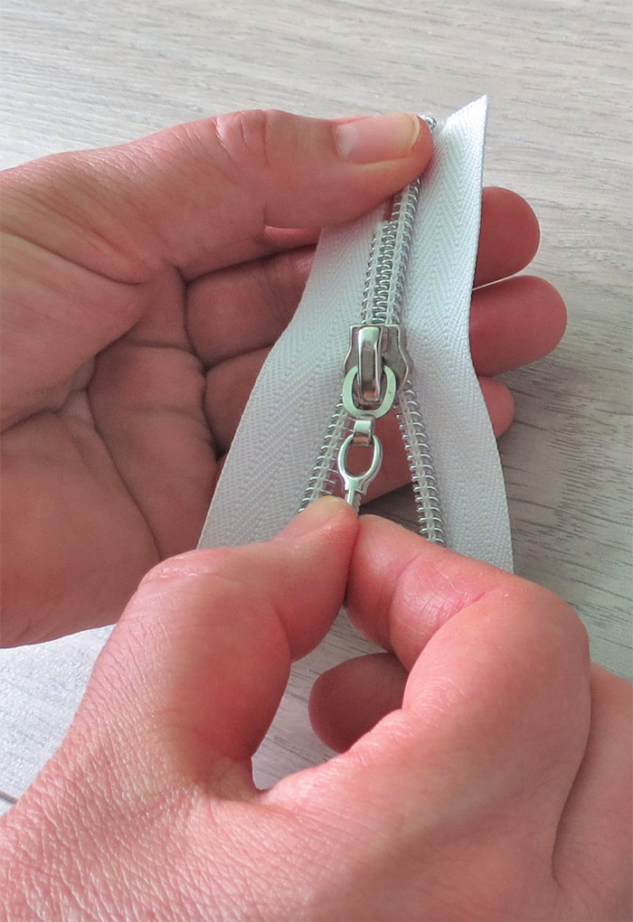 How to add slider to zipper tape