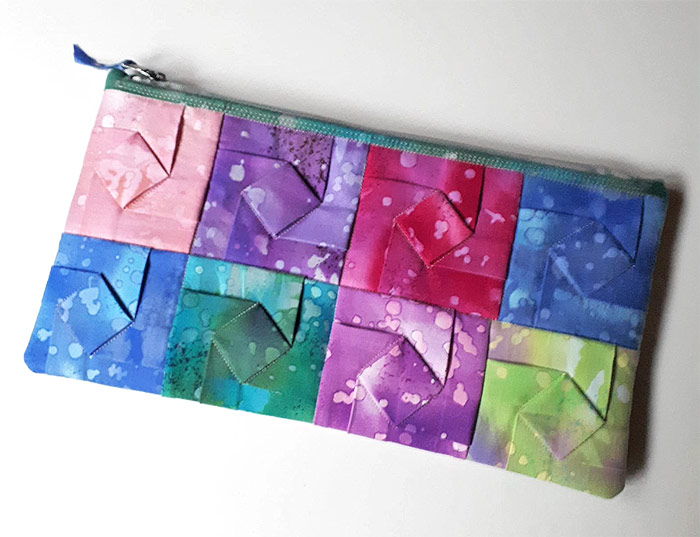 Folded fabric quilt pattern