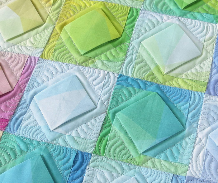 Folded fabric quilt pattern